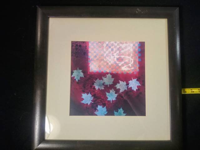 Square maple leaf framed art under glass
